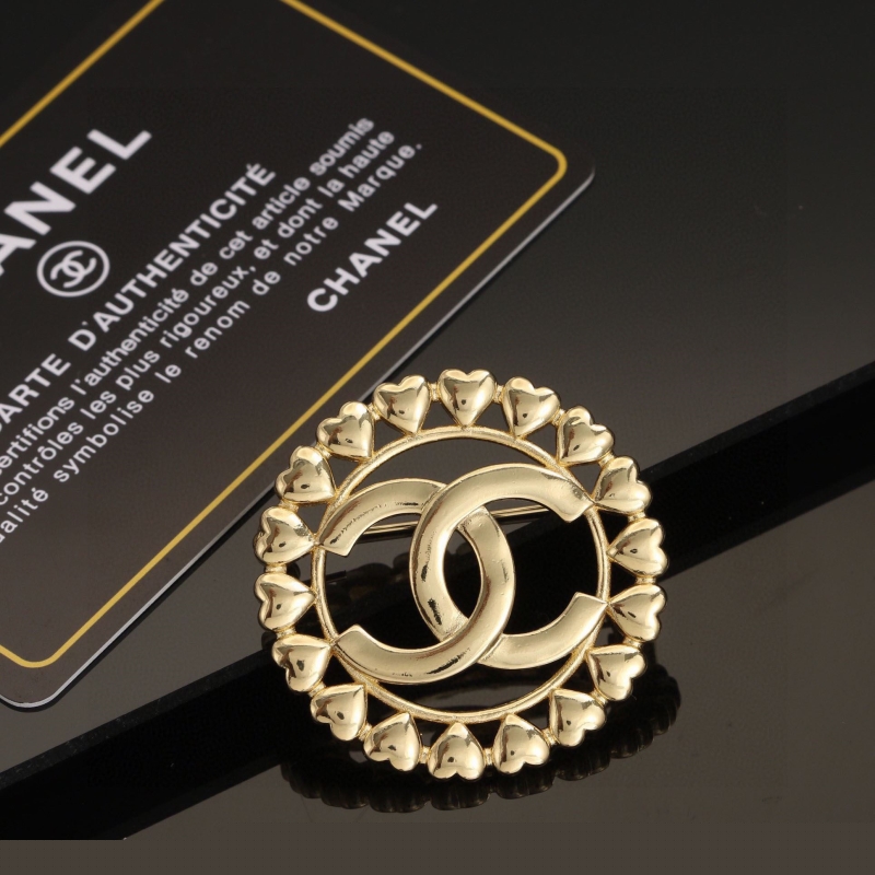 Ch*el brooches